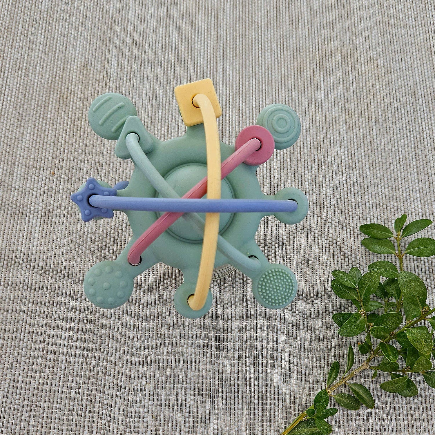 Orbit Baby silikona attīstošā rotaļlieta